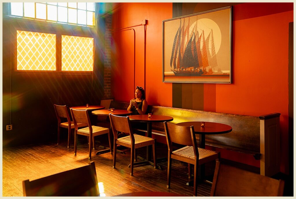 A sunlit corner of a bar in Asheville, NC.