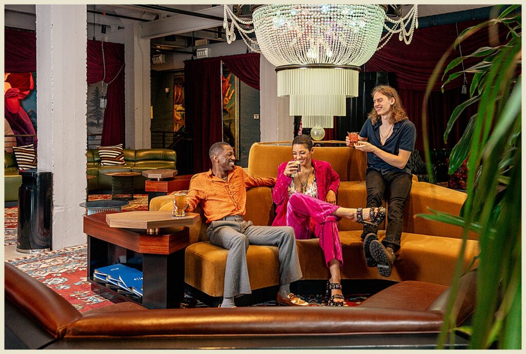 People drinking alcoholic beverages at the Radical Hotel in Asheville, NC